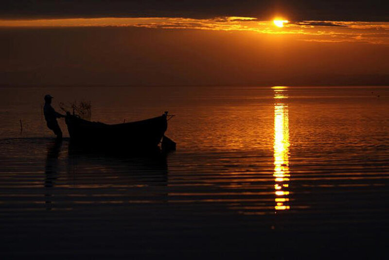 Fisherman with Boat