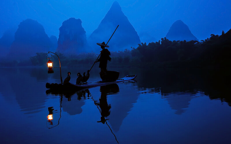 Fisherman with Cormorants