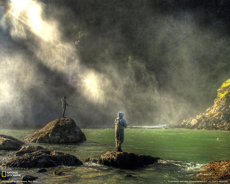 Fishermen at a waterfall