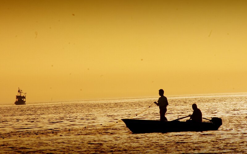 Fishermen at sunset