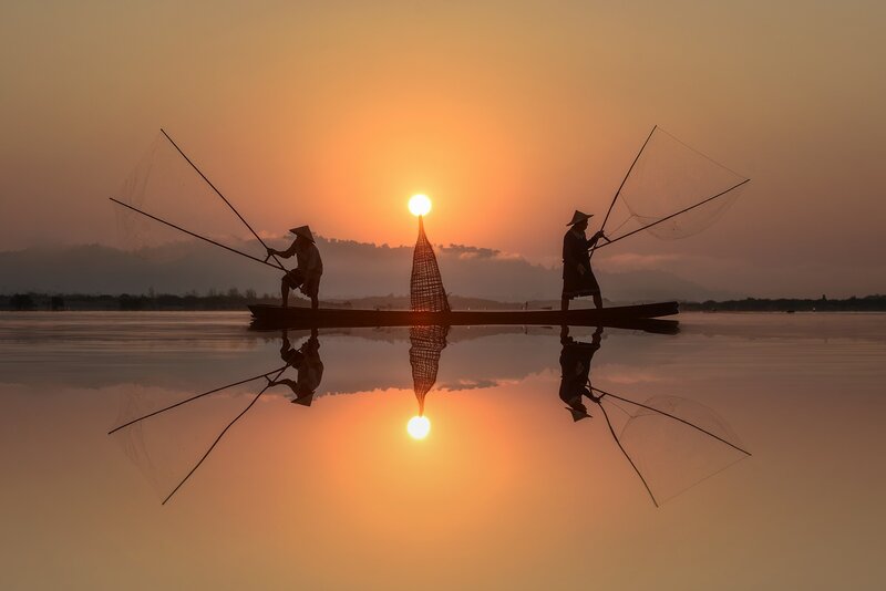 Fishermen on a Boat — Orange, Serene