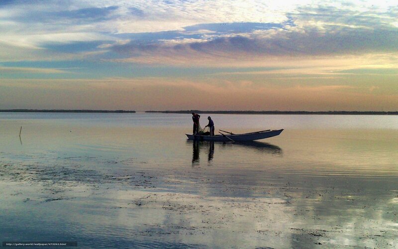Fishermen on a calm lake