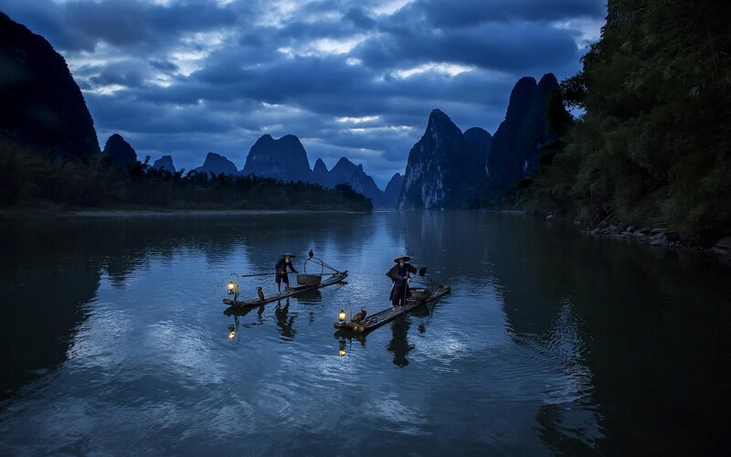 Fishermen on Bamboo Rafts — Blue