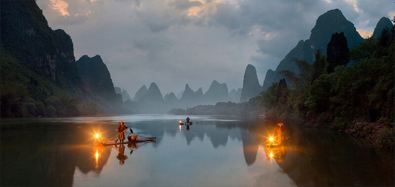 Fishermen on Bamboo Rafts
