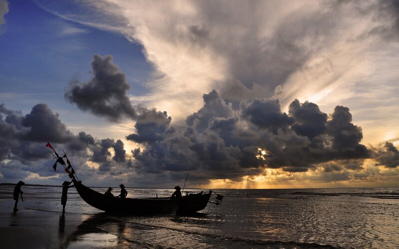 Fishermen on Beach — Blue, Dramatic, Sunset, Photograph, Boat, Clouds