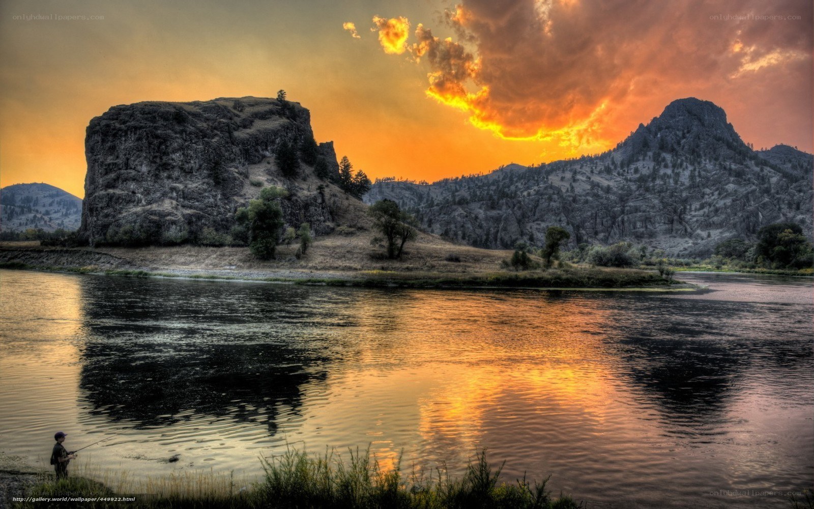 Fishing at sunset by the river