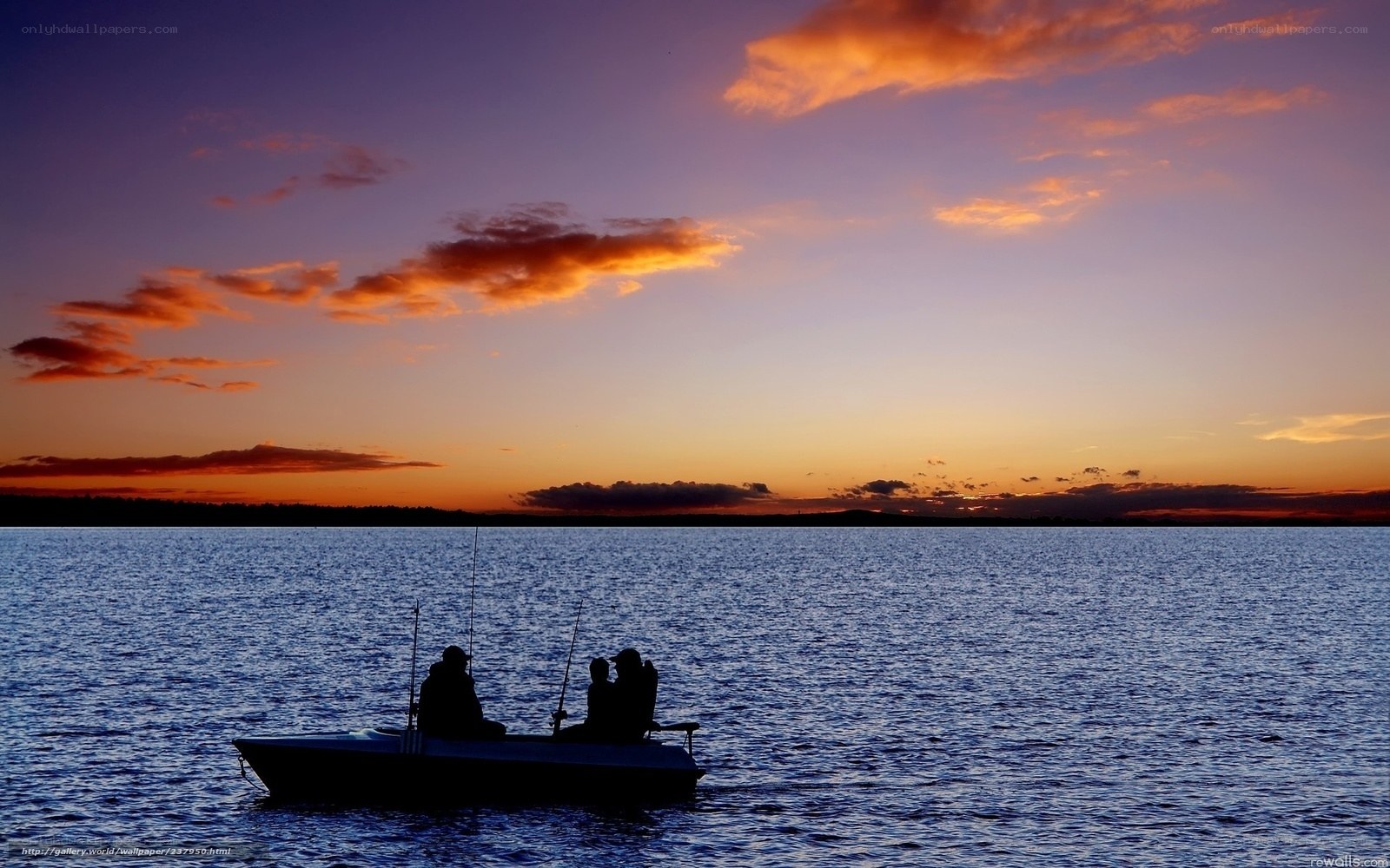 Fishing at sunset on a lake