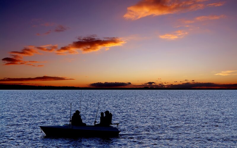 Fishing at sunset on the lake