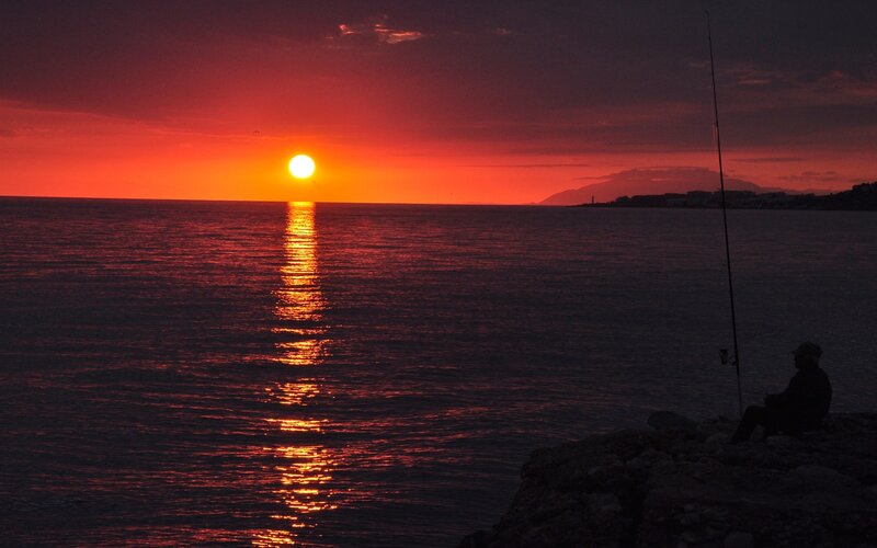 Fishing at sunset