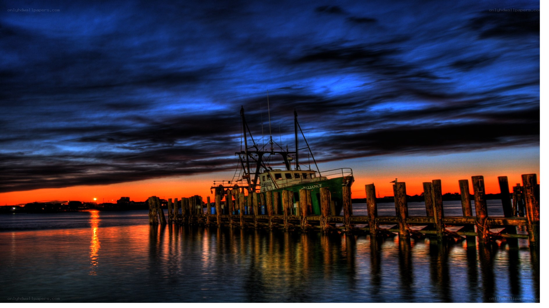Fishing boat at sunset