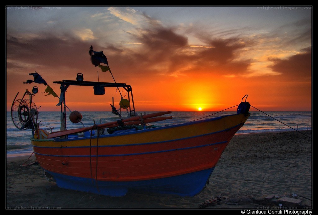 Fishing boat at sunset