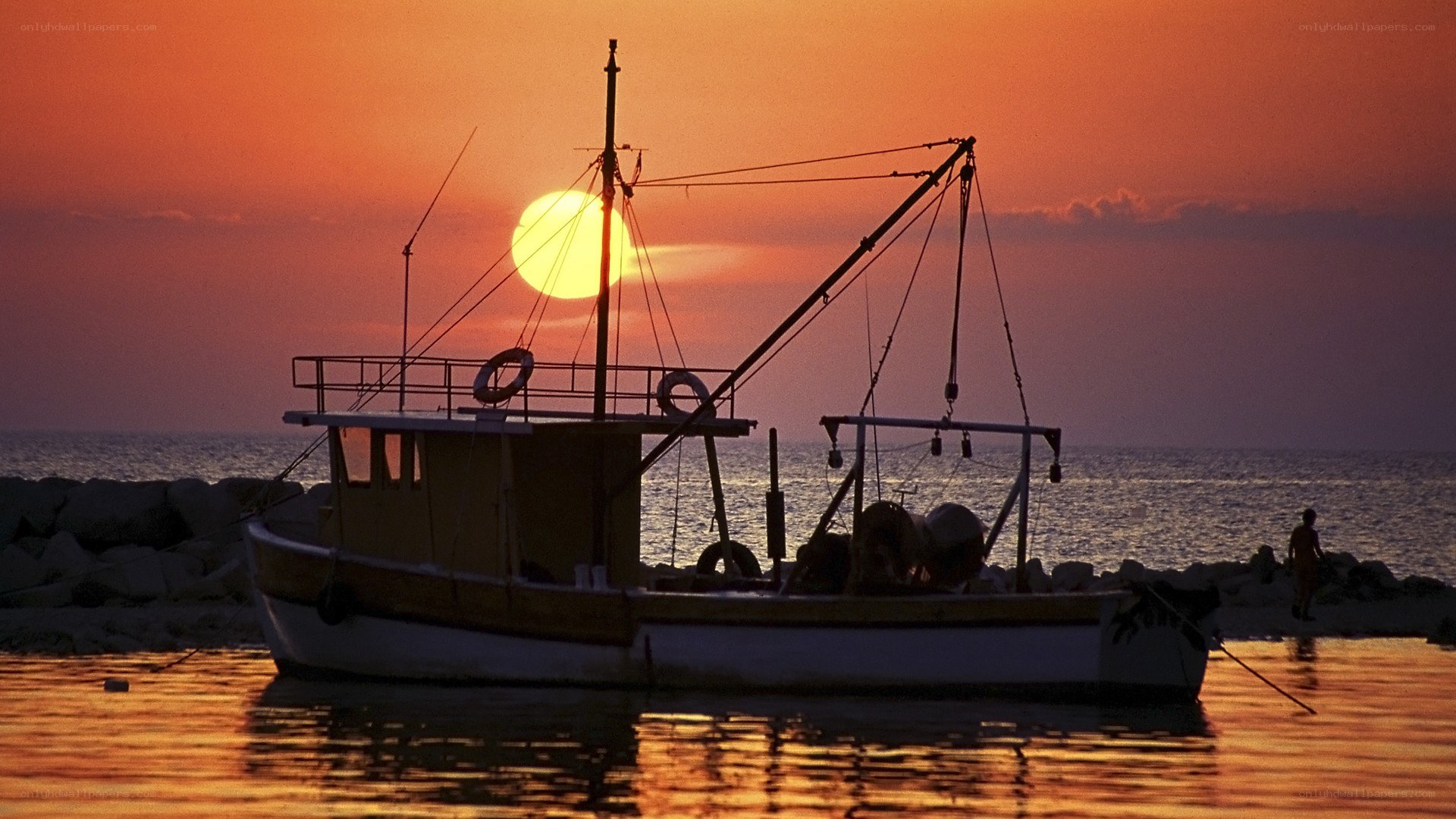 Fishing boat at sunset
