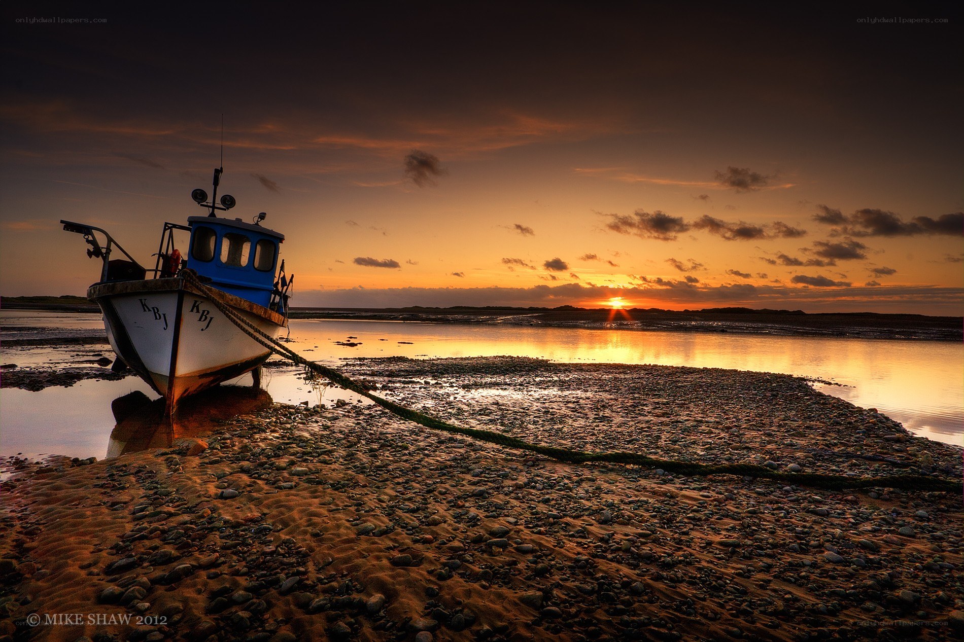 Fishing boat at sunset