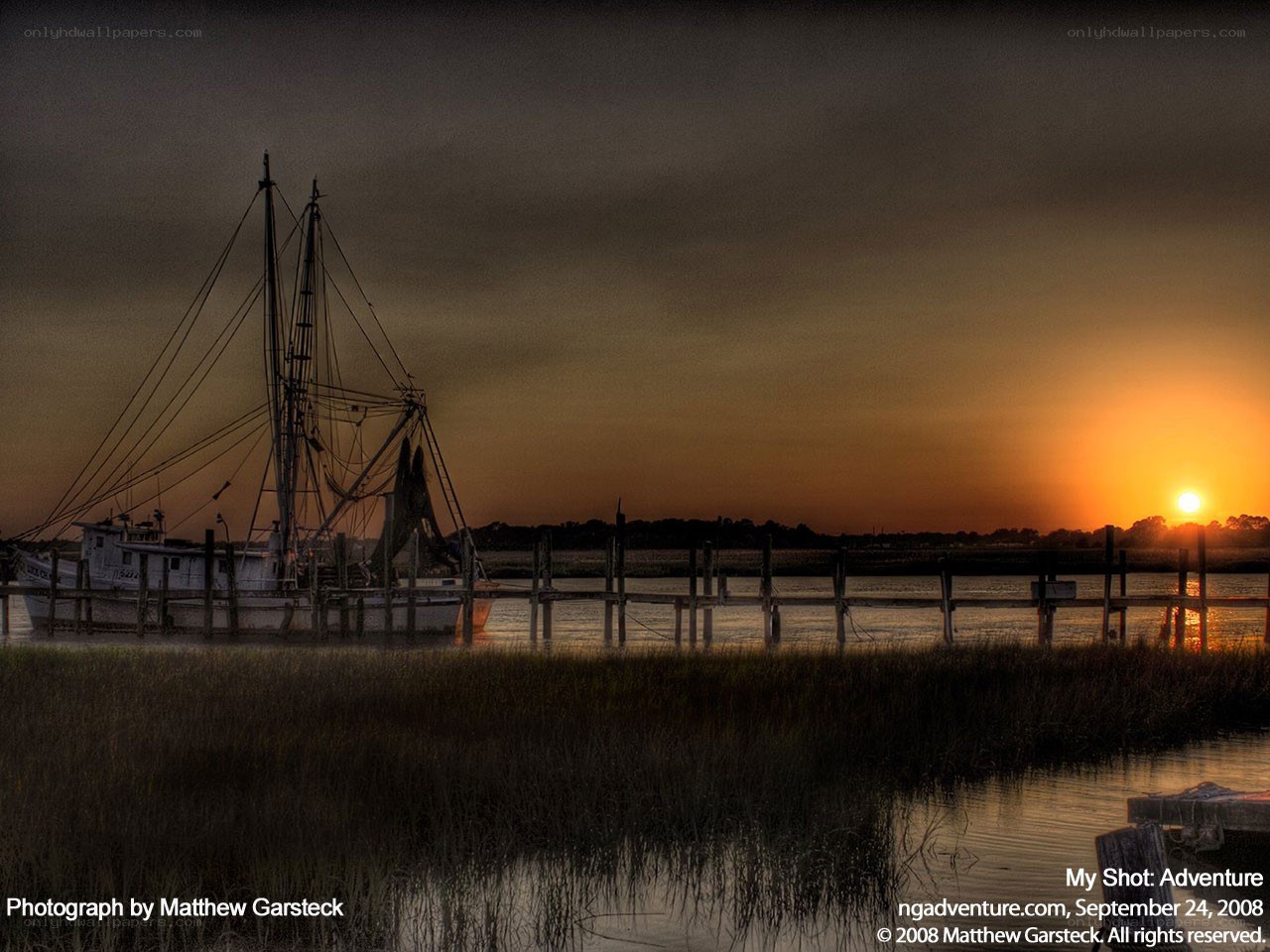 Fishing boat at sunset