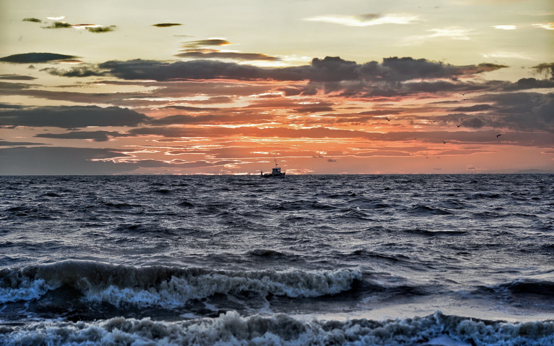 Fishing boat at sunset