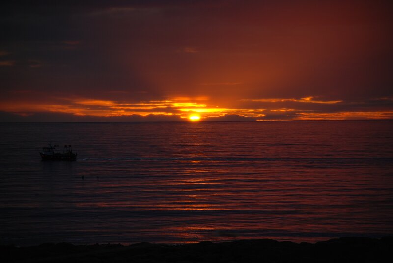 Fishing Boat at Sunset — Orange, Dramatic, Photograph, Sun