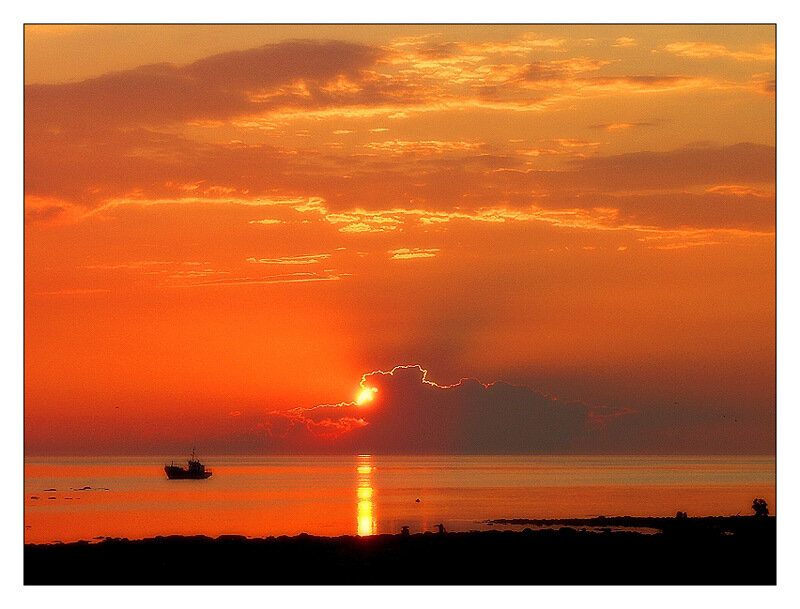 Fishing Boat at Sunset — Orange, Serene, Photograph, Sun, Clouds