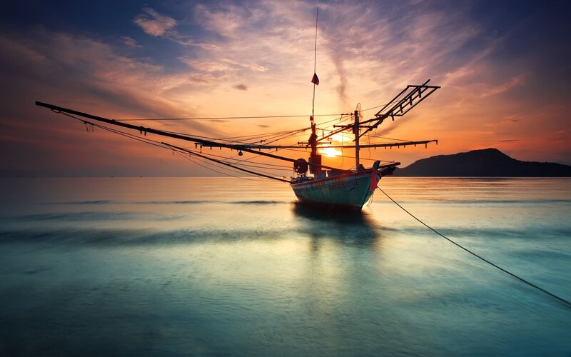 Fishing Boat at Sunset — Orange, Serene, Photograph, Sun, Mountain