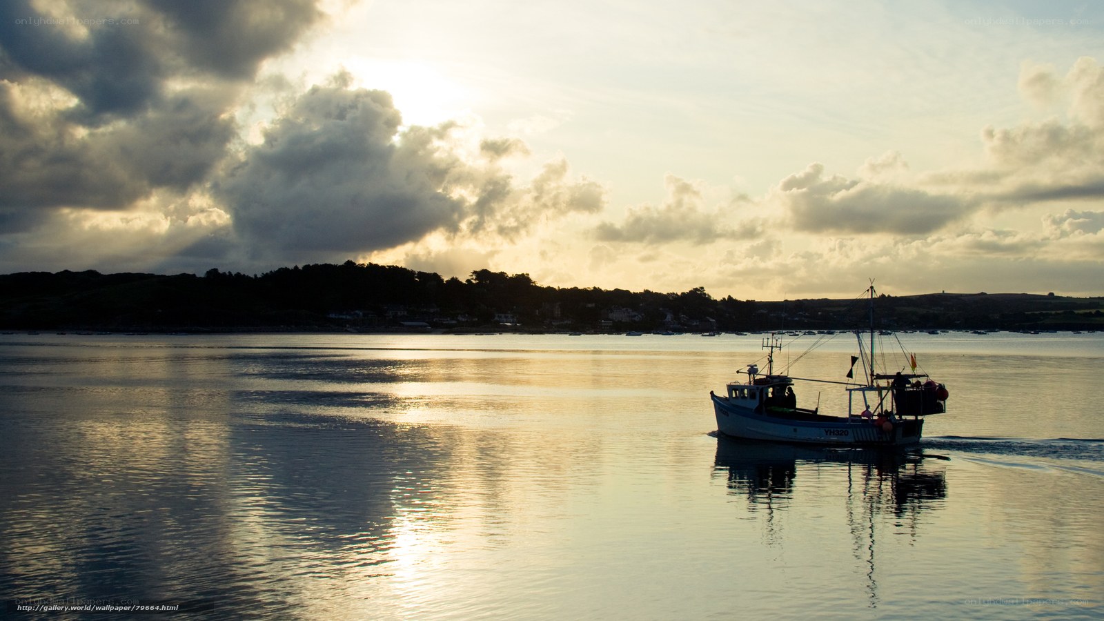 Fishing boat at sunset