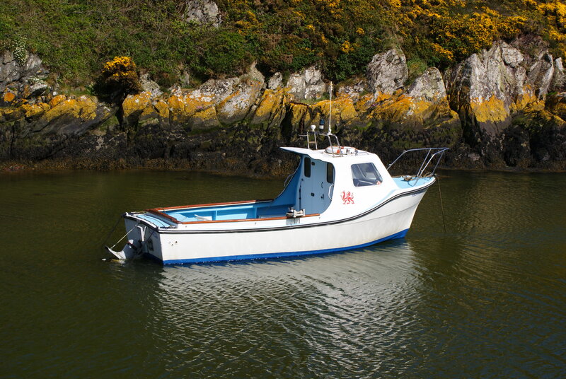 Fishing boat in a cove