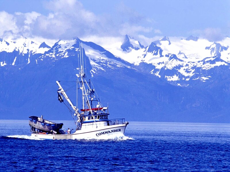 Fishing boat in mountainous waters