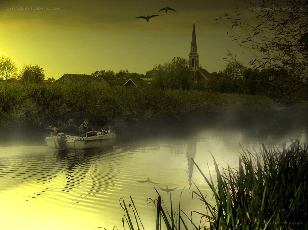 Fishing boat on a misty river