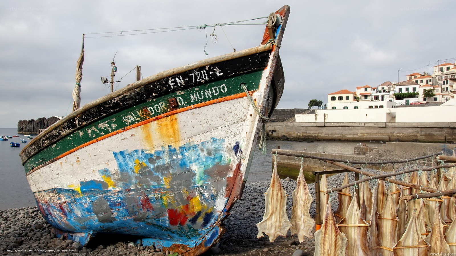 Fishing boat on a pebble beach
