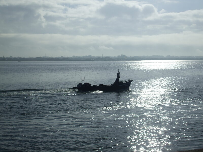 Fishing boat on calm water