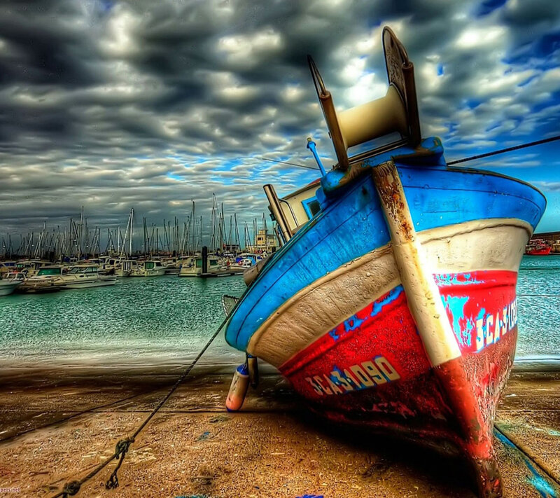 Fishing Boat on Shore — Blue