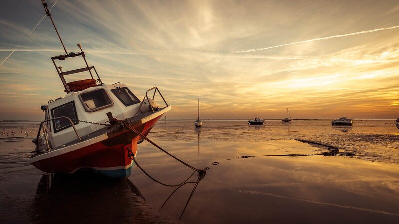 Fishing Boat on Shore — Orange