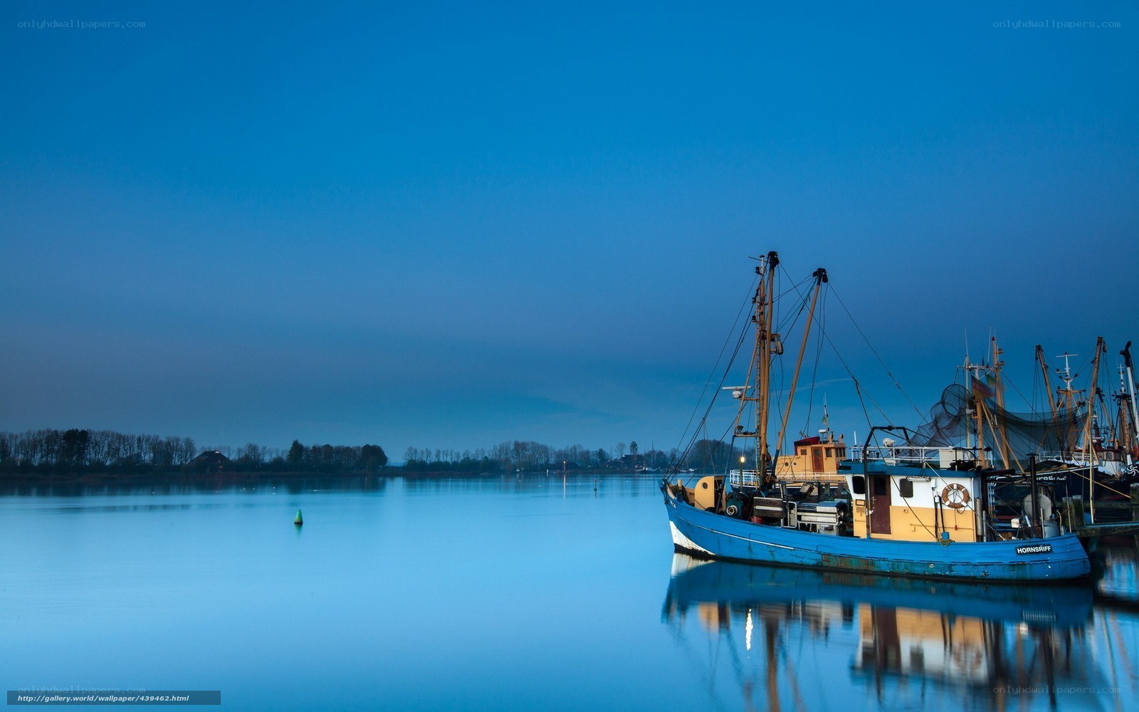 Fishing boats at dusk