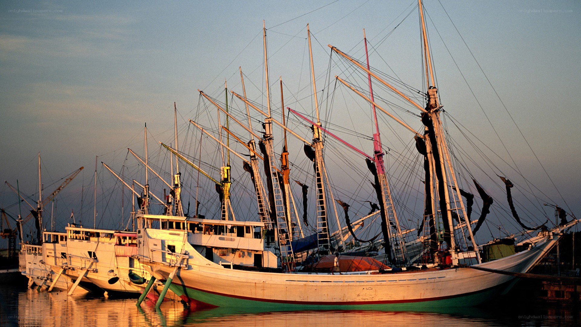 Fishing boats at sunset