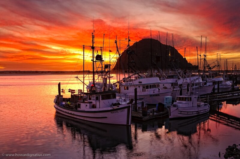Fishing boats at sunset