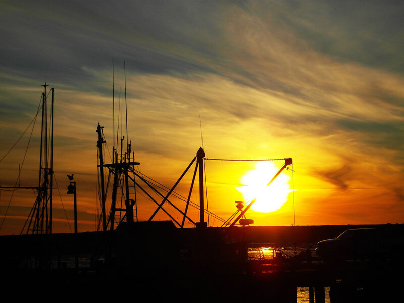 Fishing boats at sunset