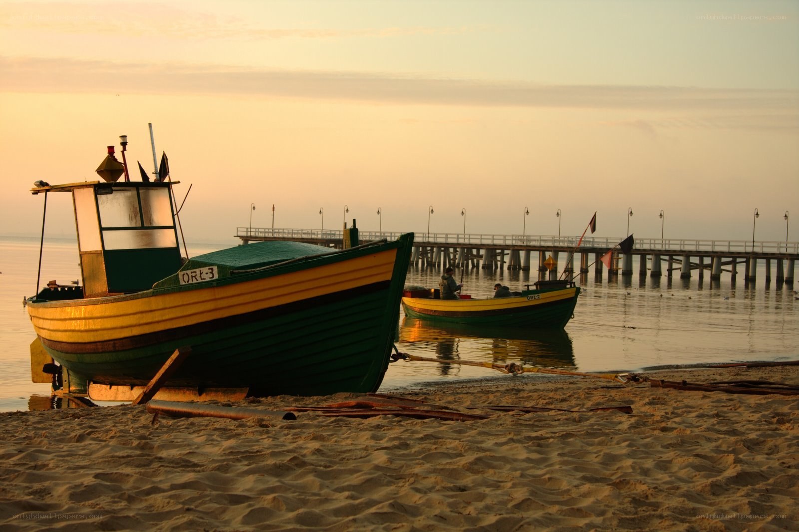 Fishing boats at sunset