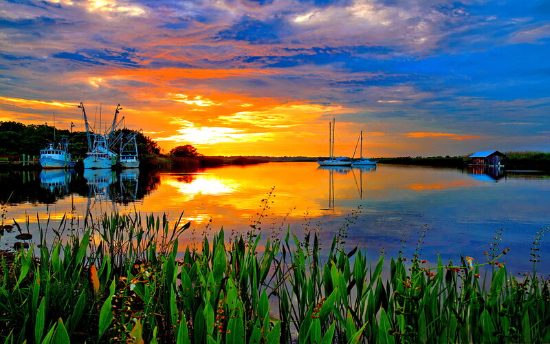 Fishing Boats at Sunset — Orange, Serene, Photograph, River
