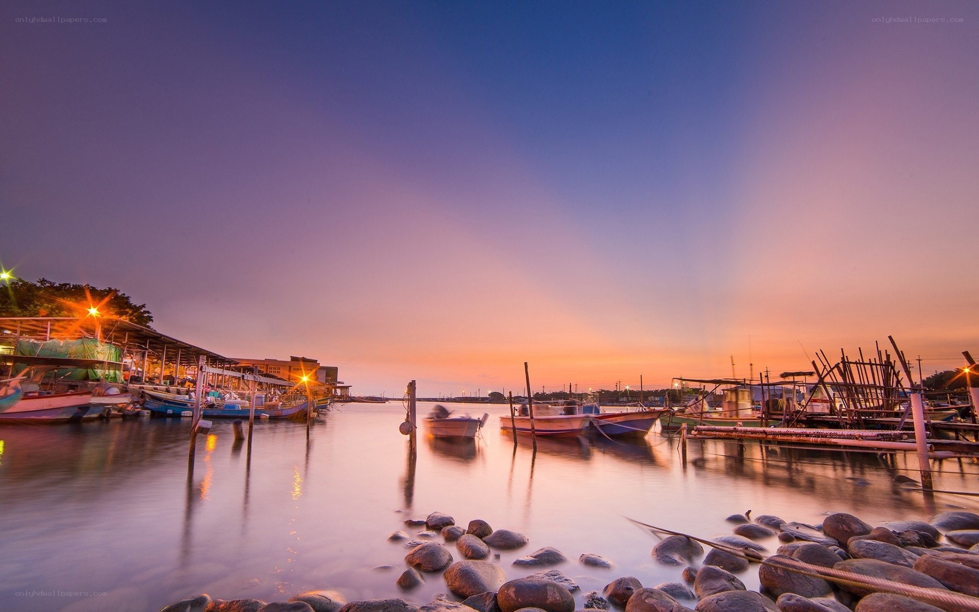 Fishing boats at sunset