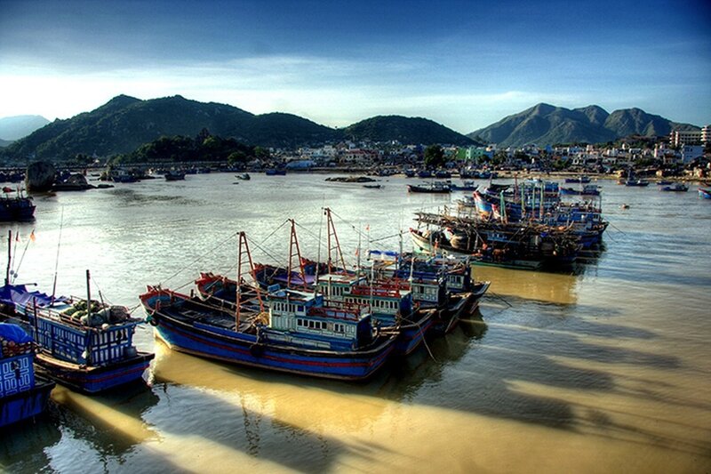 Fishing boats in a coastal harbor