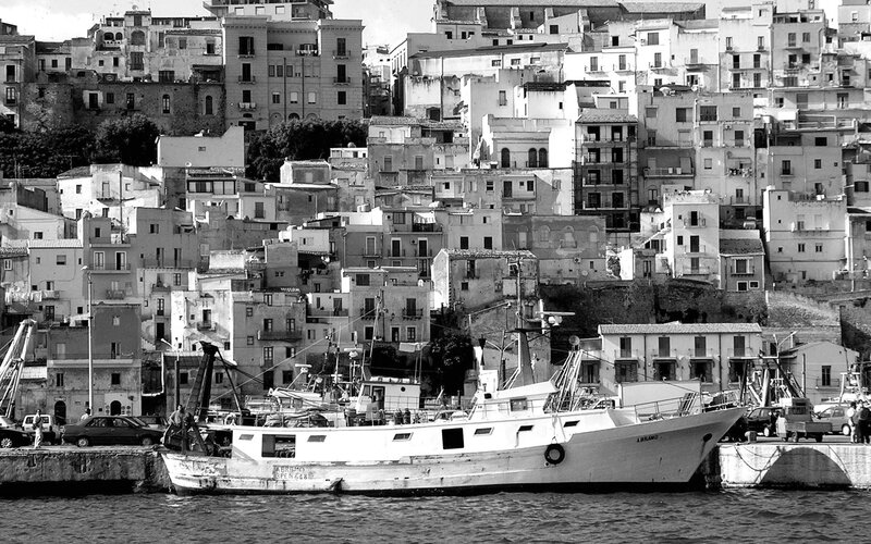Fishing boats in coastal town