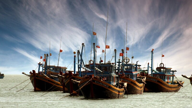 Fishing Boats in Harbor — Blue, Dramatic, Afternoon, Photograph, Flags