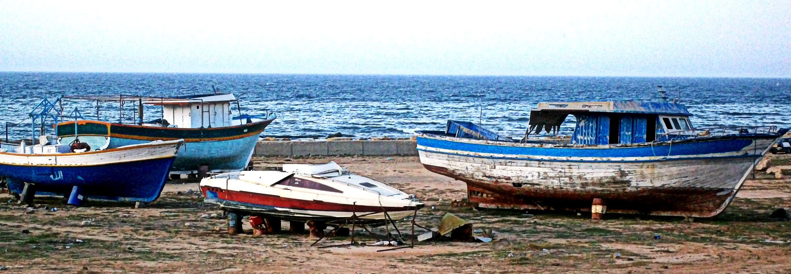 Fishing boats on a beach