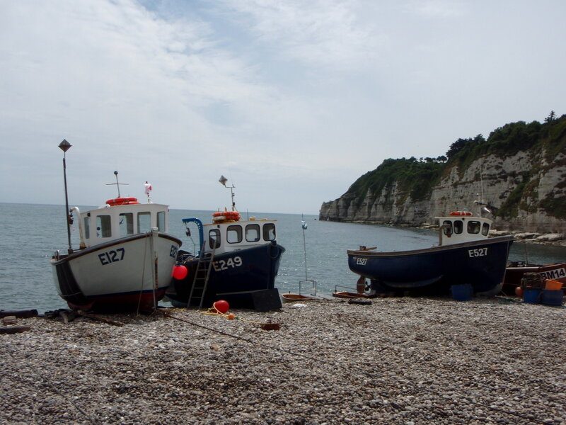 Fishing boats on a pebble beach