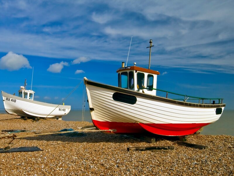 Fishing boats on a pebble beach