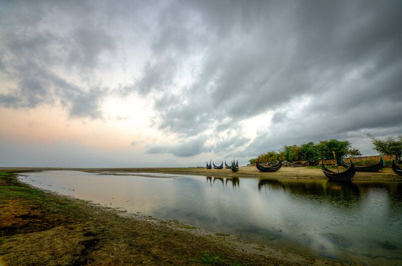 Fishing Boats on Shore — Gray, Dramatic