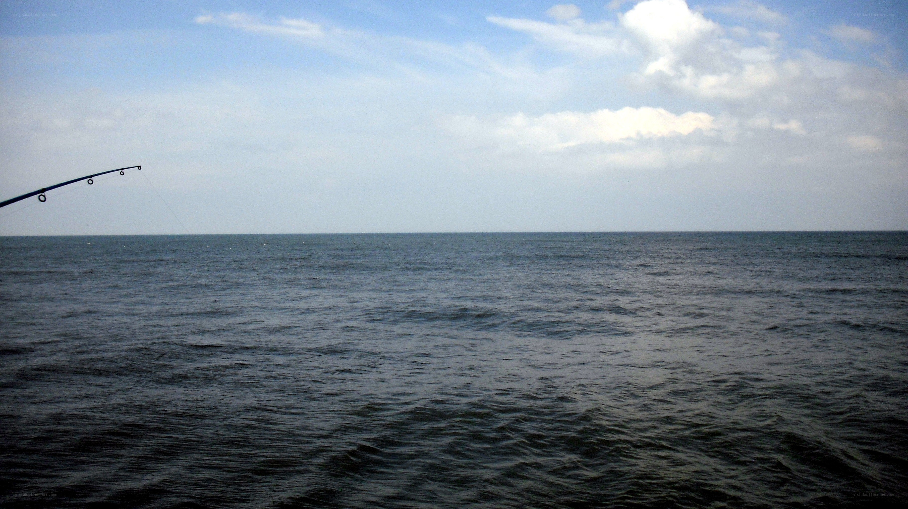 fishing rod over the ocean