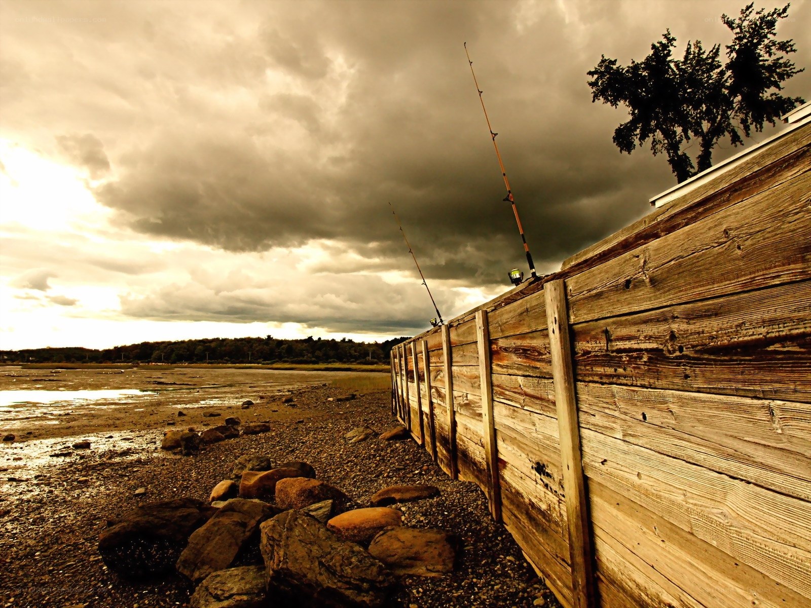 Fishing rods on a stormy shore