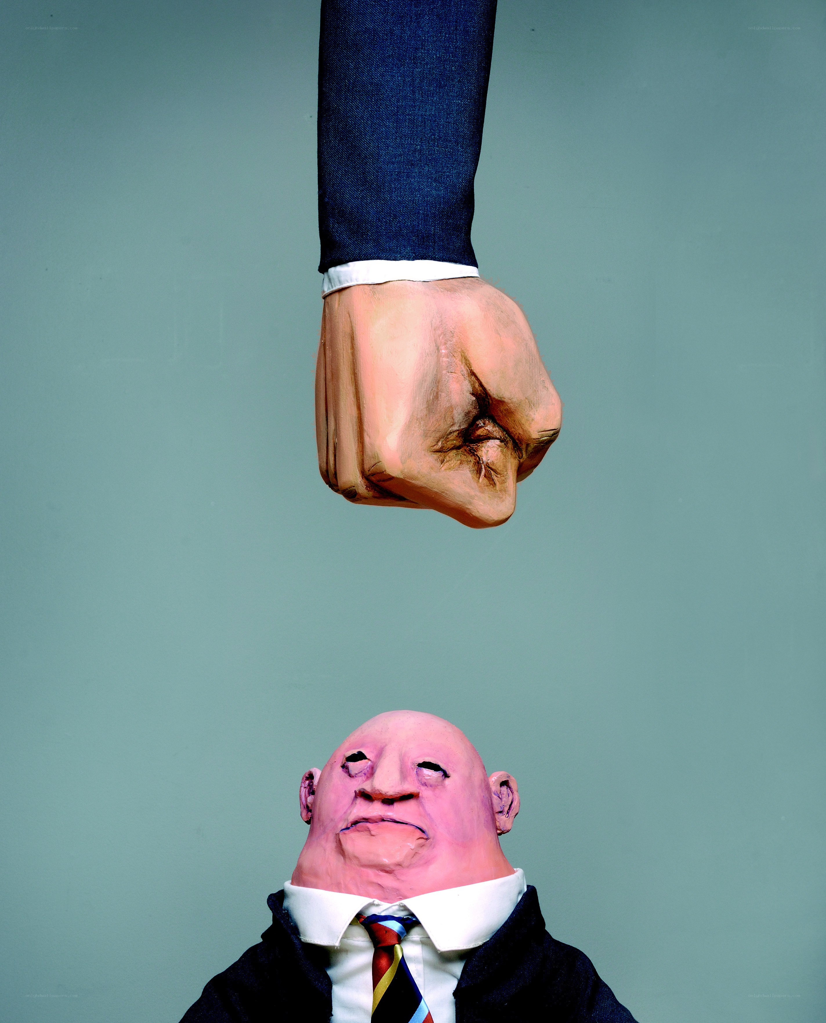 Fist above a man's head
