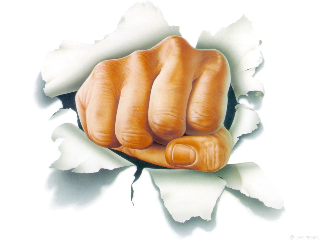 fist breaking through paper