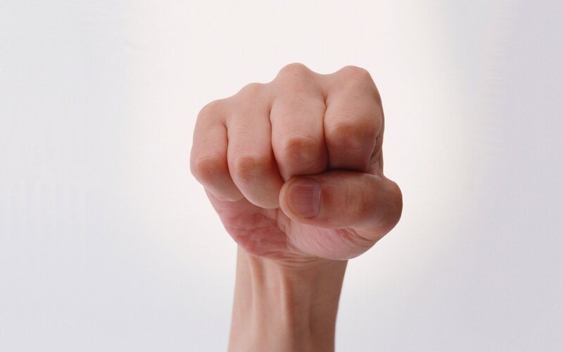 fist clenched in determination