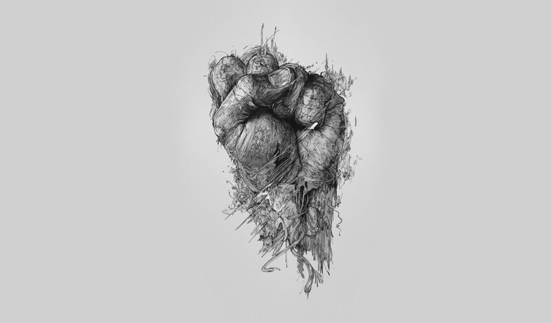fist emerging from stone